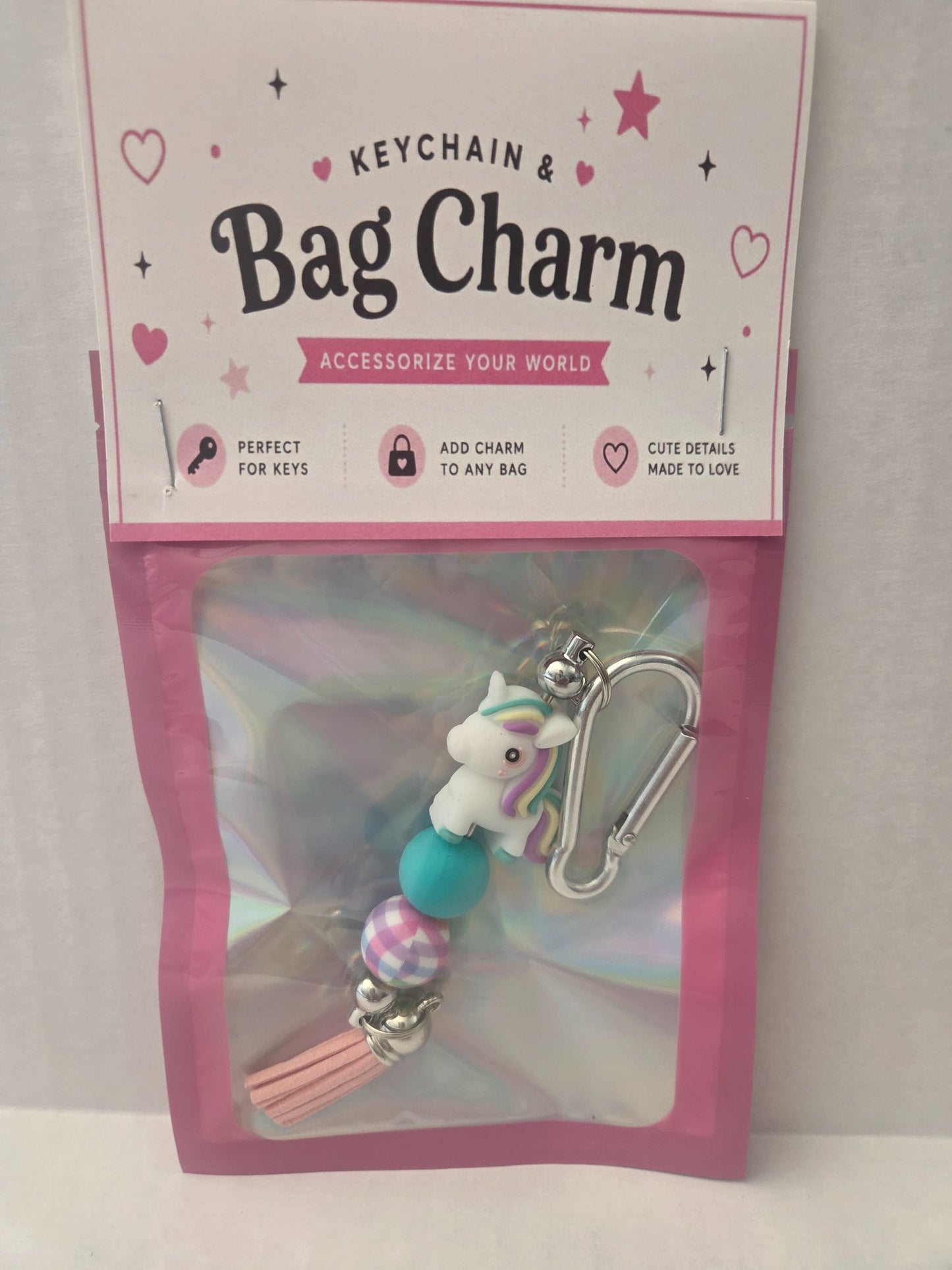 6a041d51b48fe50b080237df_bag-charm-unicorn-pink-tassel_1783107863695.jpg