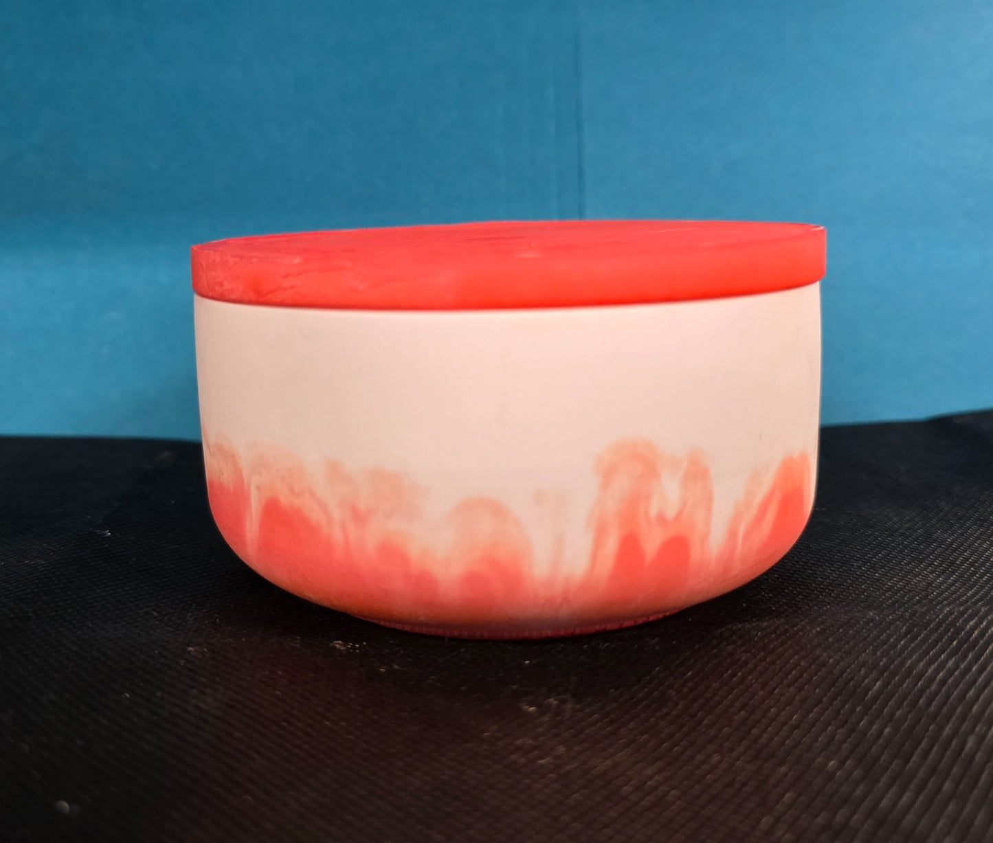 6a041d51b48fe50b080237df_bowl-w-lid-candle-red-white-side-closed_1782948443979.jpg