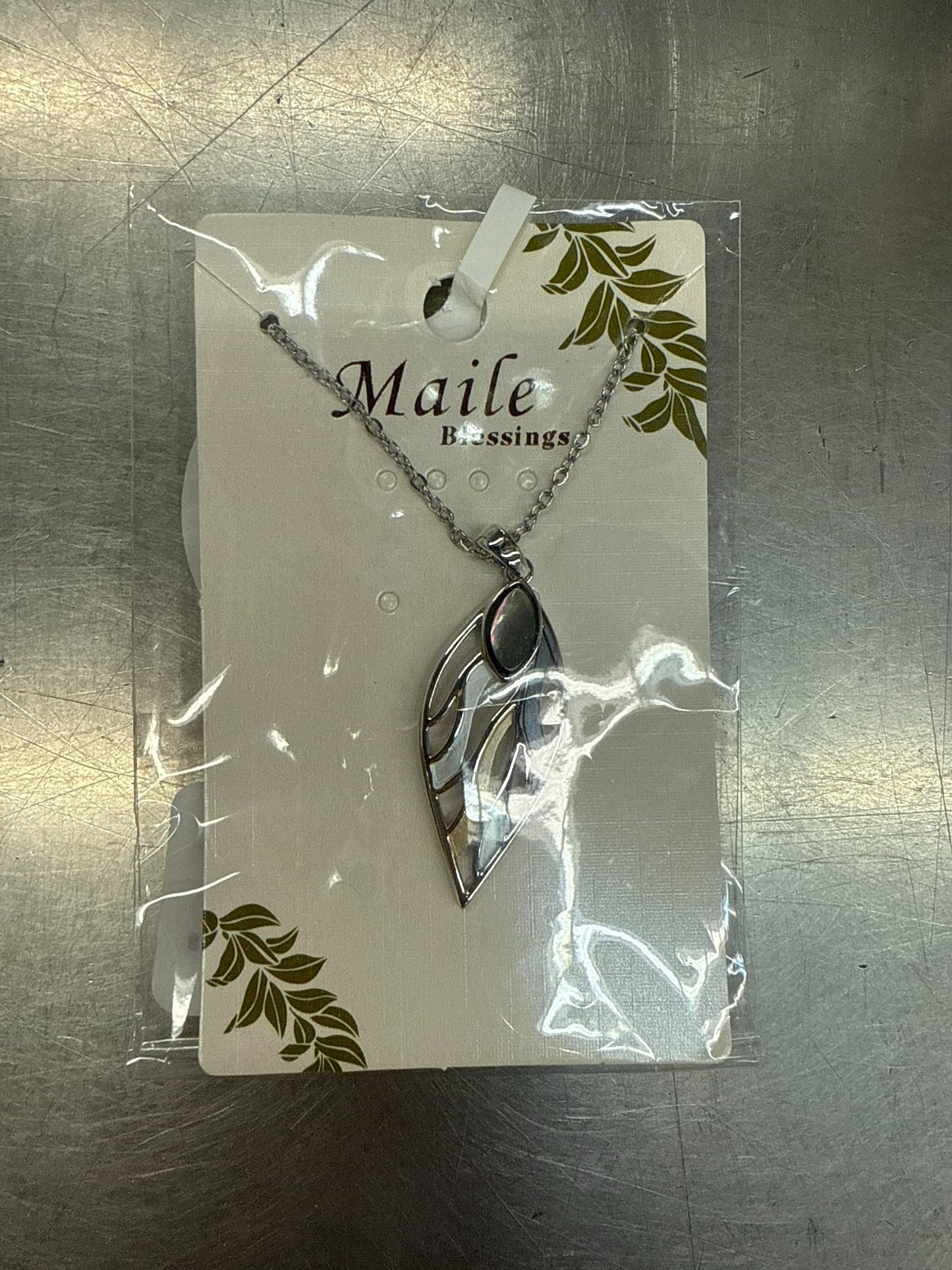 6a041d51b48fe50b080237df_raindrop-necklace-maile_1784254926441.jpg