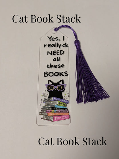 6a041d51b48fe50b080237df_10-cat-book-stack_1782074145346.jpg