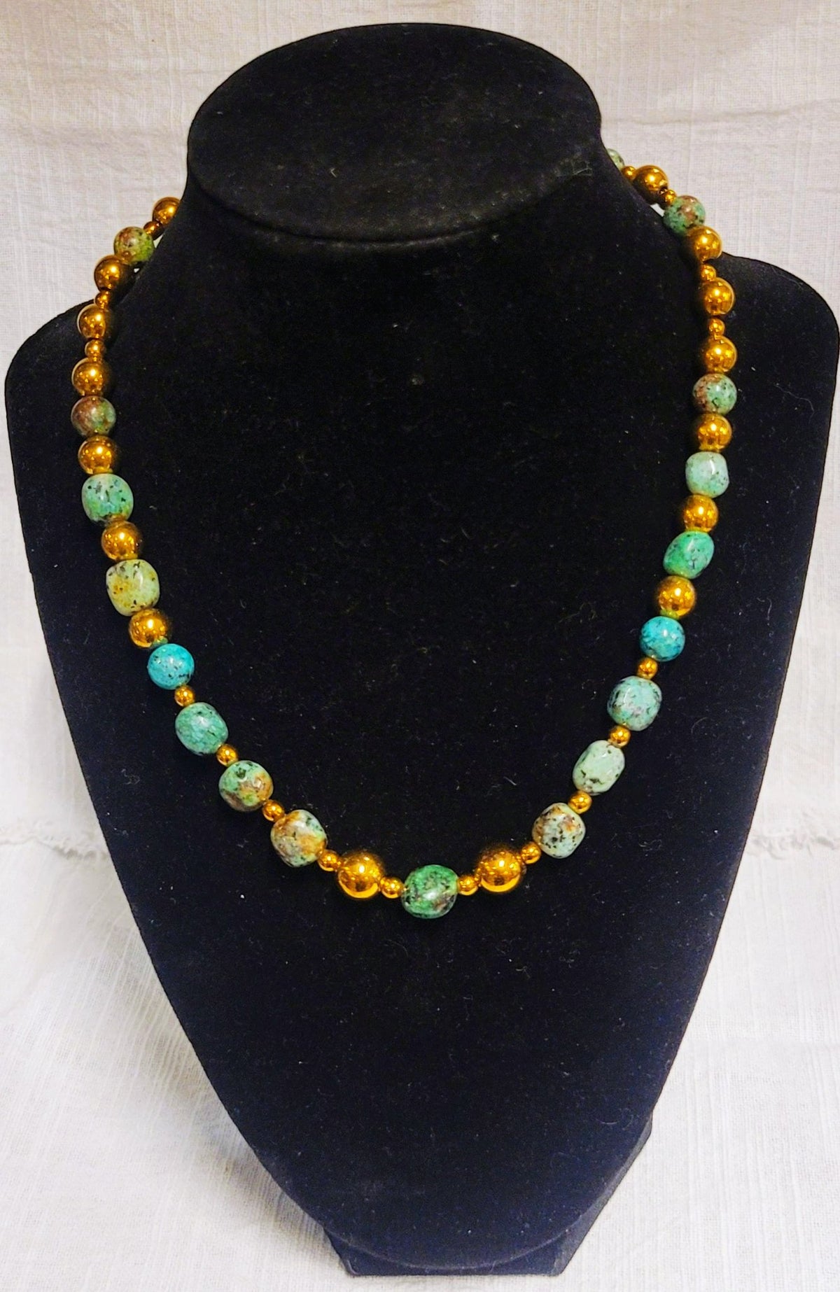 6a041d51b48fe50b080237df_african-turquoise-necklace_1783556430135.jpg