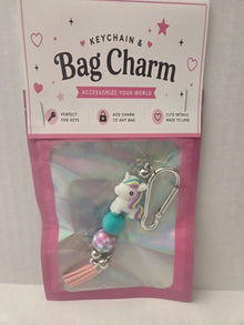 6a041d51b48fe50b080237df_bag-charm-unicorn-pink-tassel_1783107863695.jpg