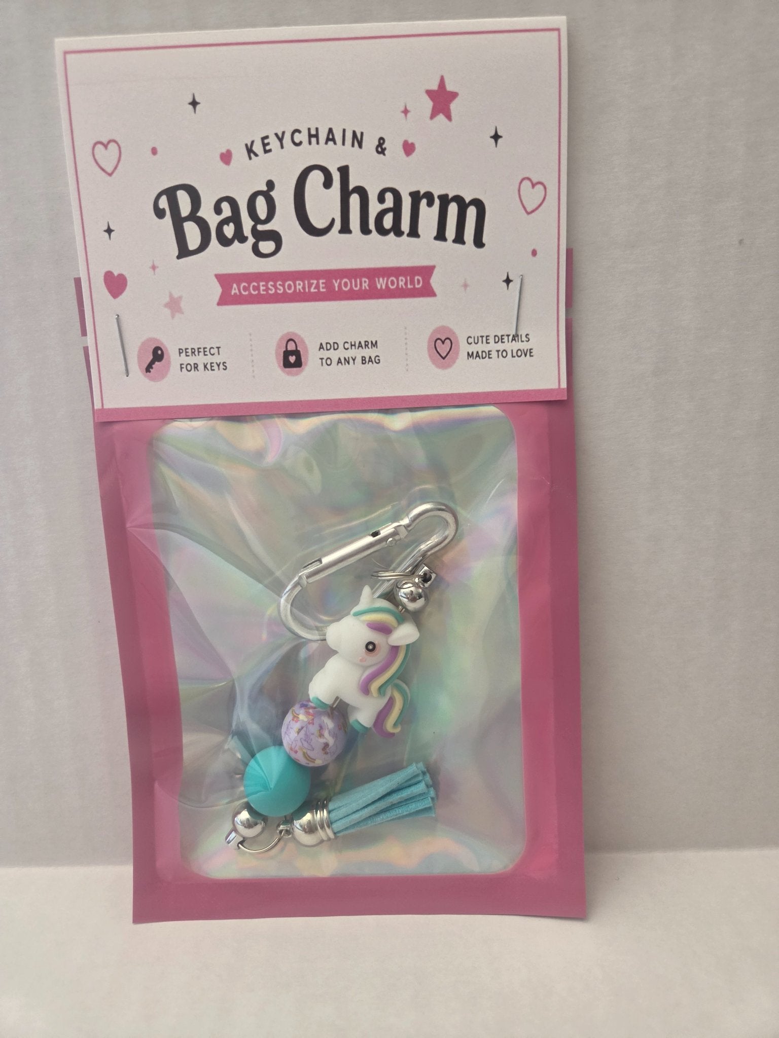 6a041d51b48fe50b080237df_bag-charm-unicorn-teal-tassel_1783108368375.jpg
