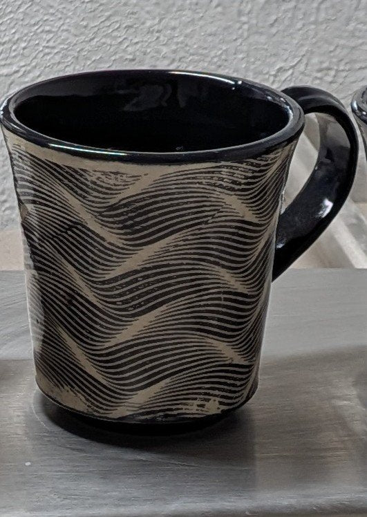 6a041d51b48fe50b080237df_black-and-white-wavey-transfer-mug_1786921365658.jpg