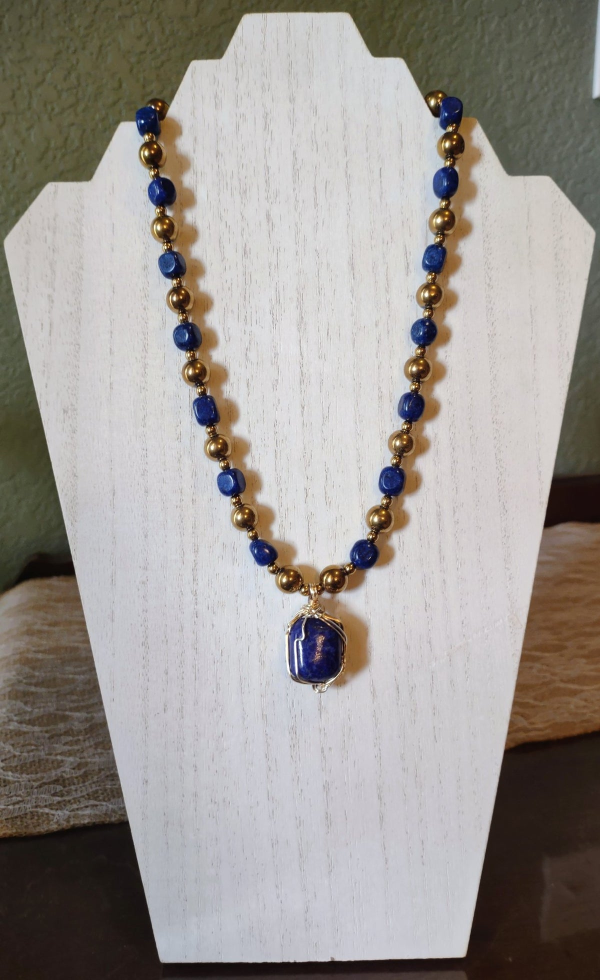 6a041d51b48fe50b080237df_blue-sodalite-with-wrapped-stone-necklace_1786666420273.jpg