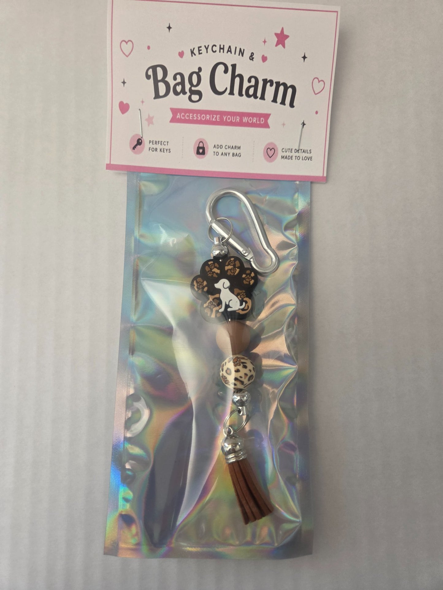 6a041d51b48fe50b080237df_brown-dog-paw-bag-charm_1783110620936.jpg