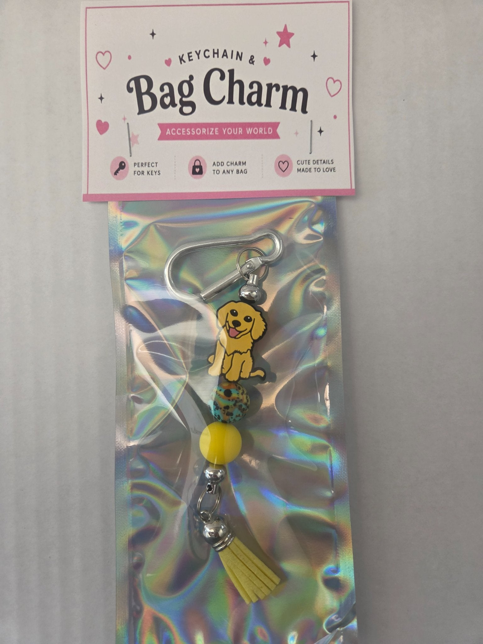 6a041d51b48fe50b080237df_golden-dog-bag-charm_1783110770021.jpg