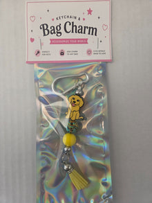 6a041d51b48fe50b080237df_golden-dog-bag-charm_1783110770021.jpg