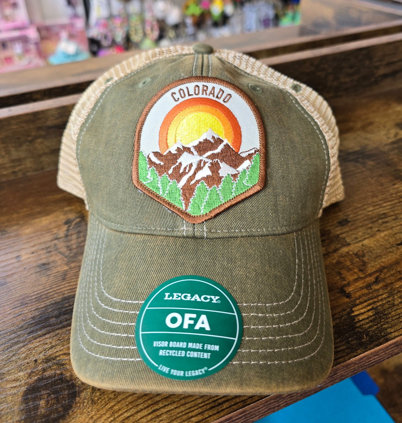 6a041d51b48fe50b080237df_hat-green-legacy-ofa-colorado-1_1783015446034.jpg