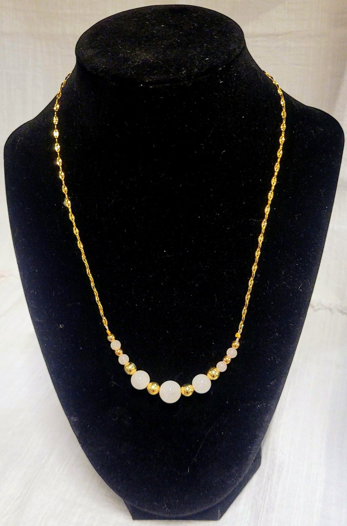 6a041d51b48fe50b080237df_rose-quartz-small-necklace_1783555883603.jpg