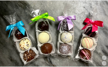 6a041d51b48fe50b080237df_screenshot-2026-07-06-at-15-54-12-trio-assorted-variety-truffle-3-pk-w-satin-bow-faire_1783875697561.png