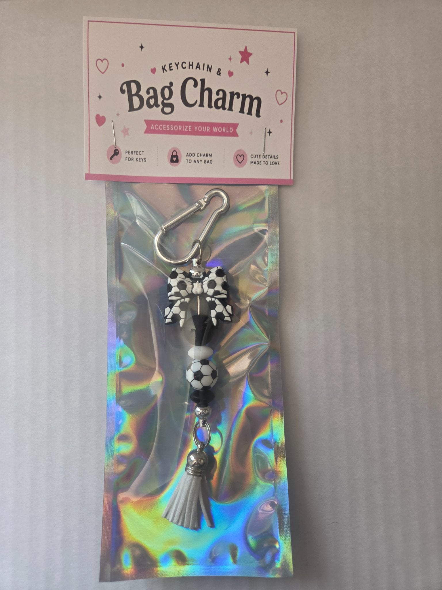 6a041d51b48fe50b080237df_soccer-bow-bag-charm_1783110287194.jpg