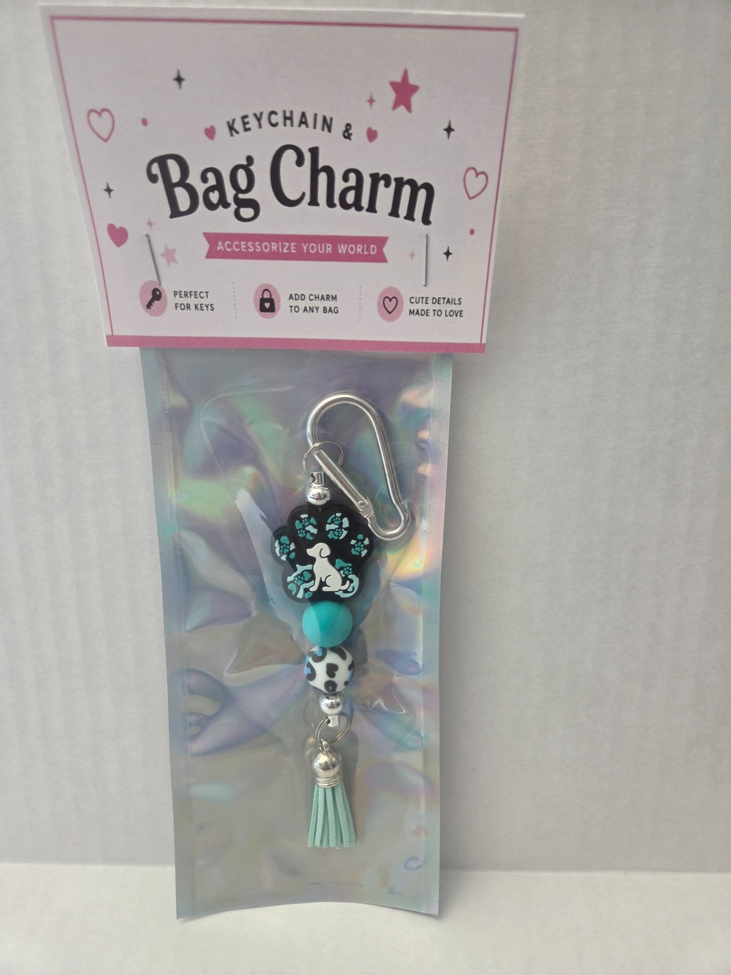 6a041d51b48fe50b080237df_teal-on-teal-dog-paw-charm_1783110162700.jpg