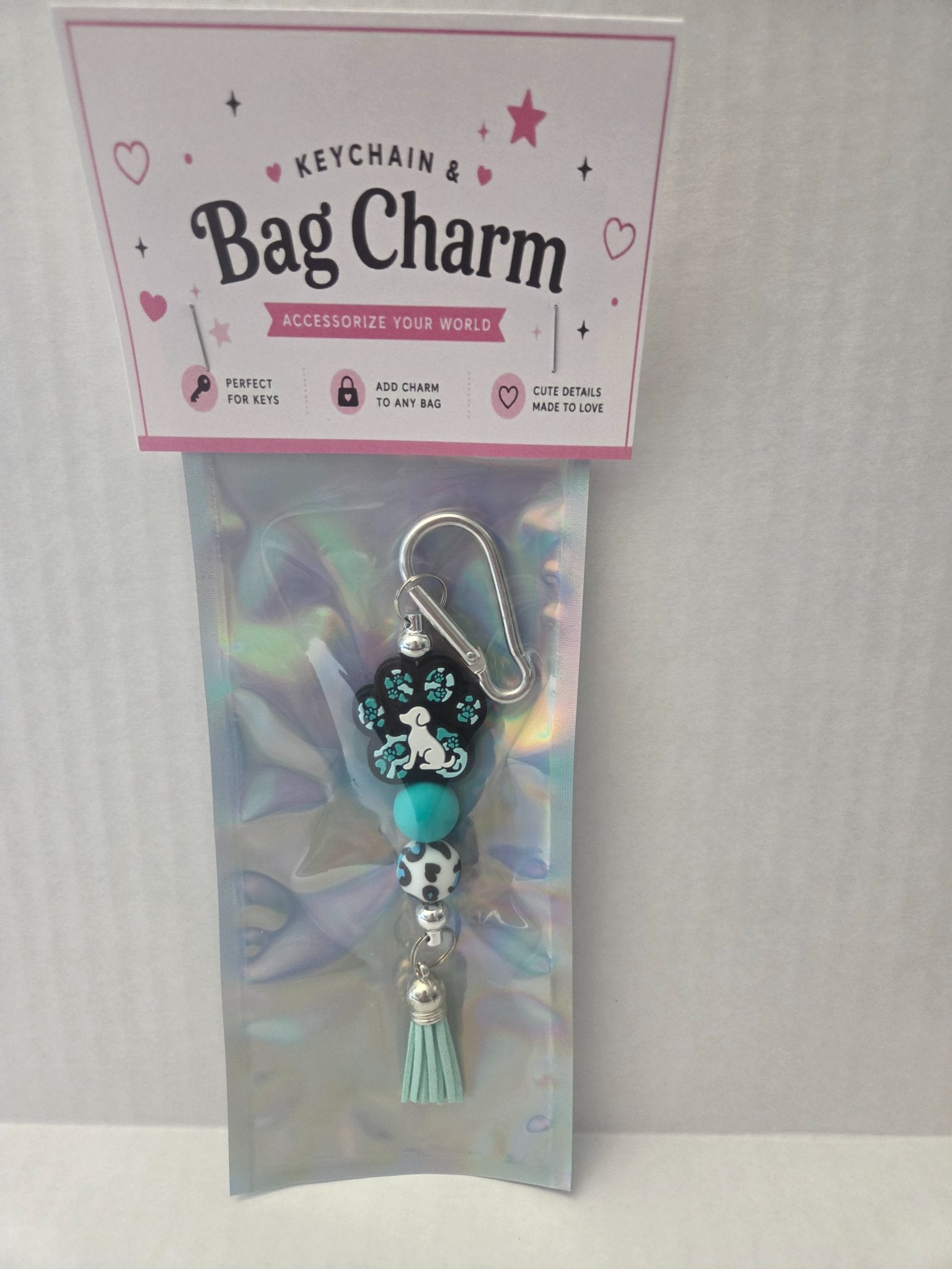 6a041d51b48fe50b080237df_teal-on-teal-dog-paw-charm_1783110162700.jpg