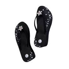 6a041d51b48fe50b080237df_top-view-platform-black-flip-flop-pave-flower-800x800_1784152856103.jpg