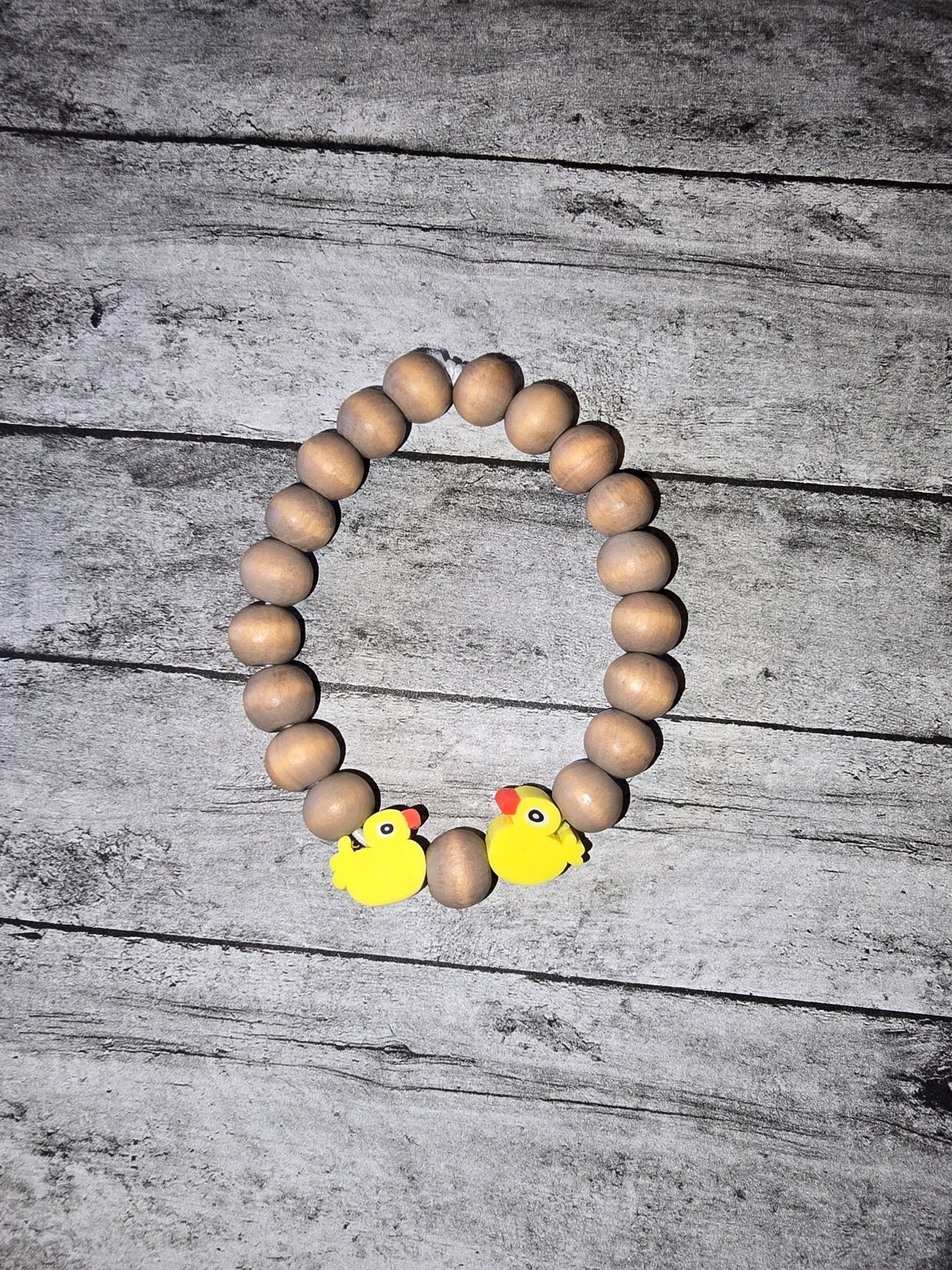 Ducks with wood beads Bracelet - made by kid Sam - Create Marketplace